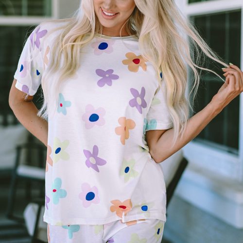 Witte tweedelige set met korte mouwen, bloemenprint en hoge taille, geschikt als homewear
