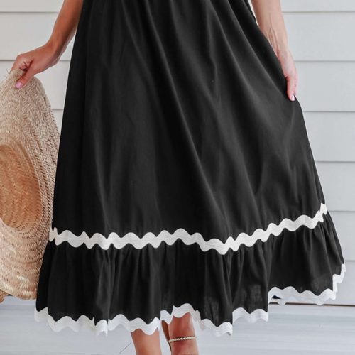 Zwarte lange rok met hoge taille en kleurblokken, afgewerkt met zigzagband